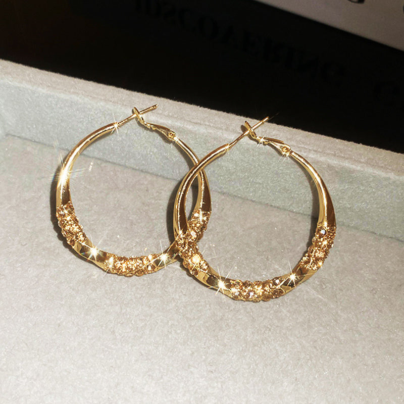 Luxury Twisted Rhinestone Earrings – Elegant, Sparkling & Timeless